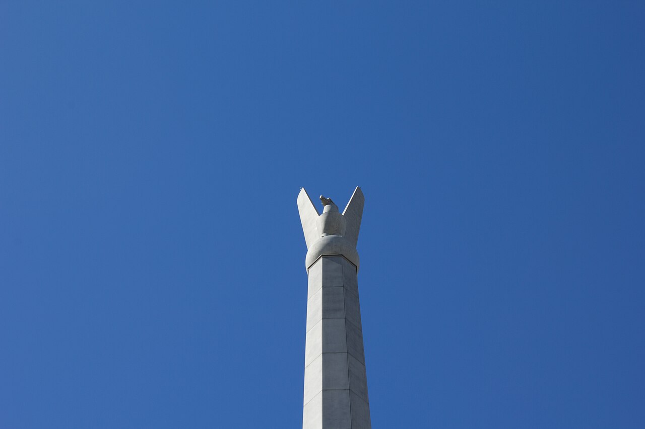 The Australian-American Memorial eagle column at Russell, Canberra, against a blue sky